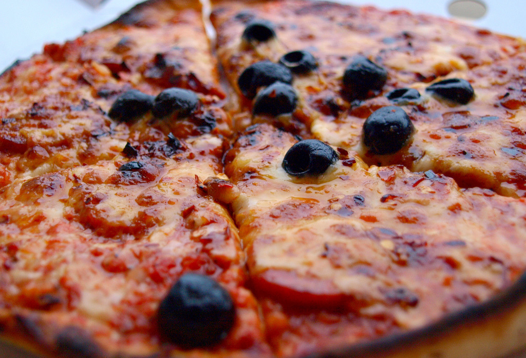 Pepperoni, Black Olives, Garlic, Chili, Cheese & Tomato Pizza
