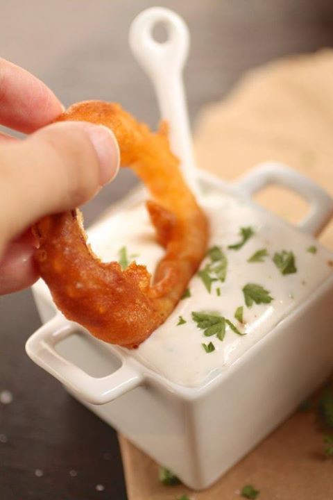 Fried onion rings with honey lime yoghurt sauce